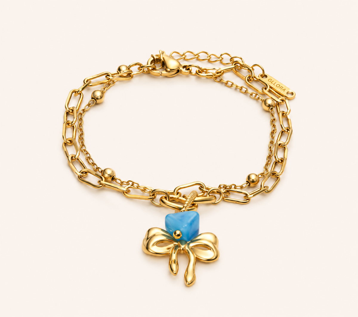 Azure Bow Charm Strand Bracelet