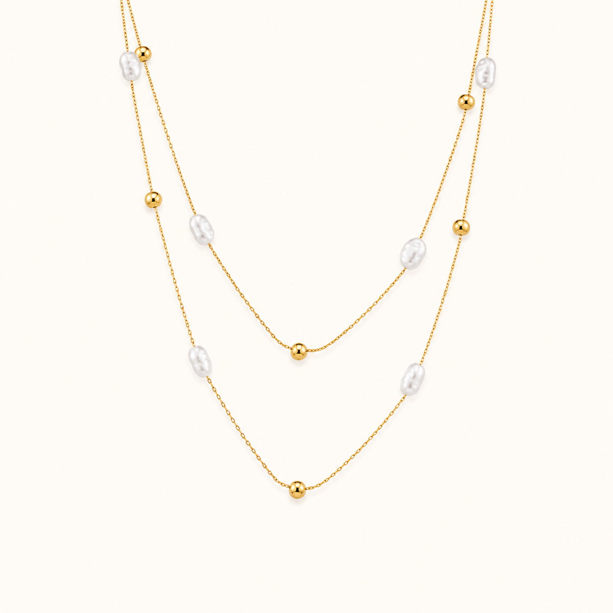 Classic pearl-style bead gold pendant necklace inspired by evergreen pearl elegance