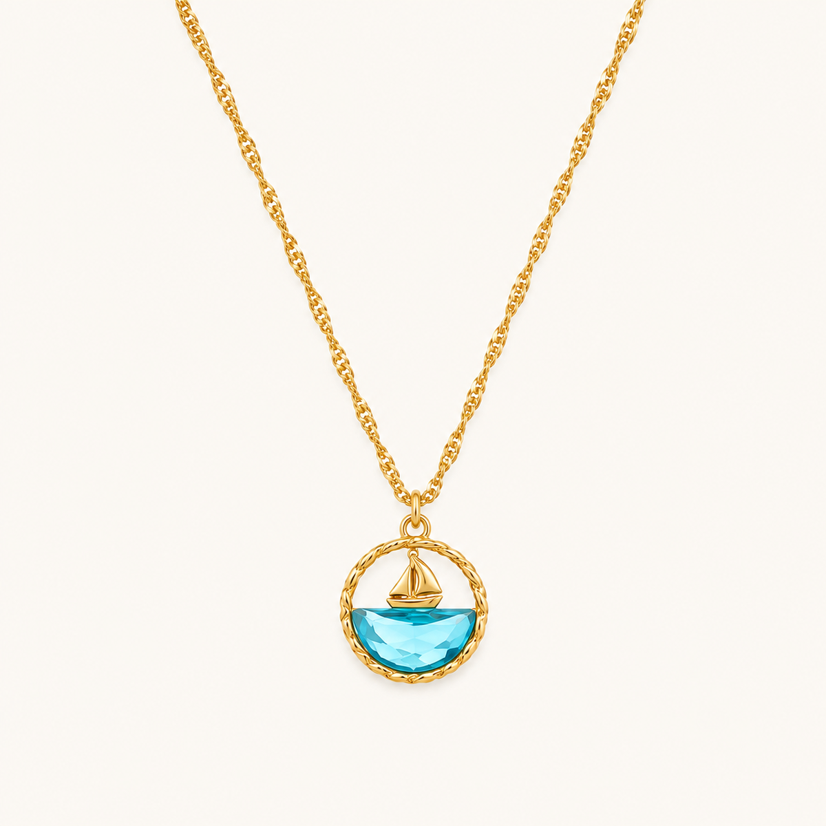 Dopamine Ocean Sailboat Pendant Necklace – round blue enamel sailboat motif pendant in gold plated finish