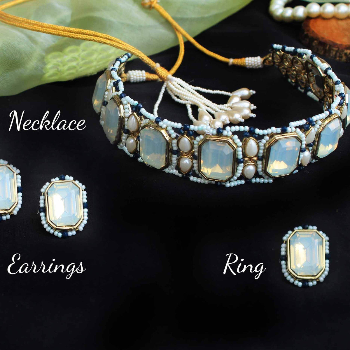 Kundan choker set in gold-tone with matching earrings and long bridal necklace, perfect for wedding functions , festive and bridal wear