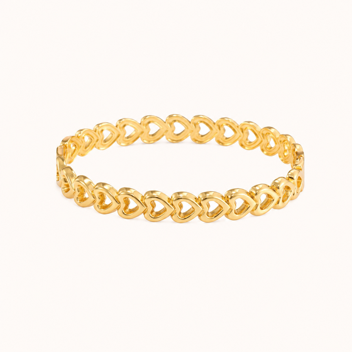 Eternal Heart Bangle – repeating heart motif gold plated bangle for women