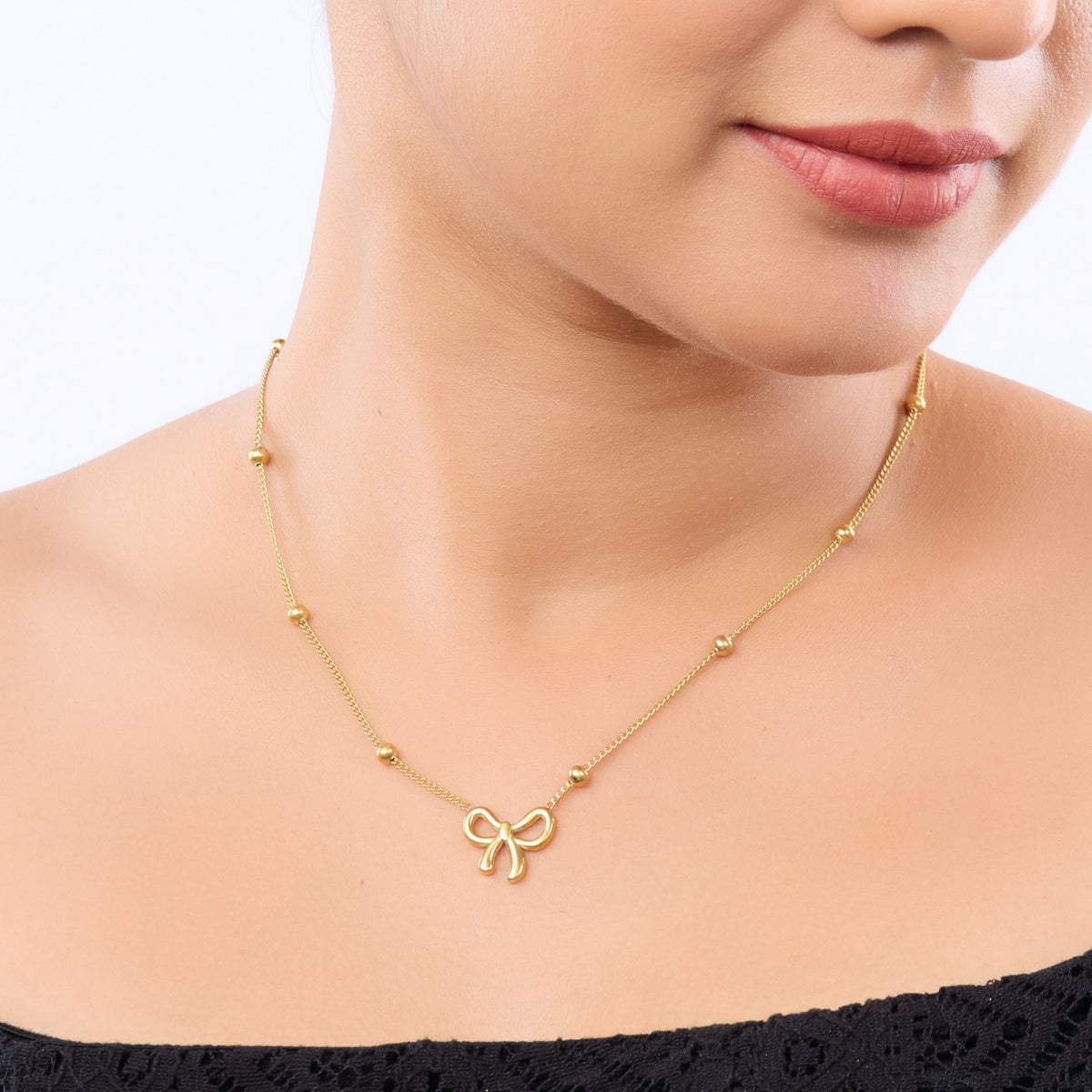 Golden Bow Charm Necklace
