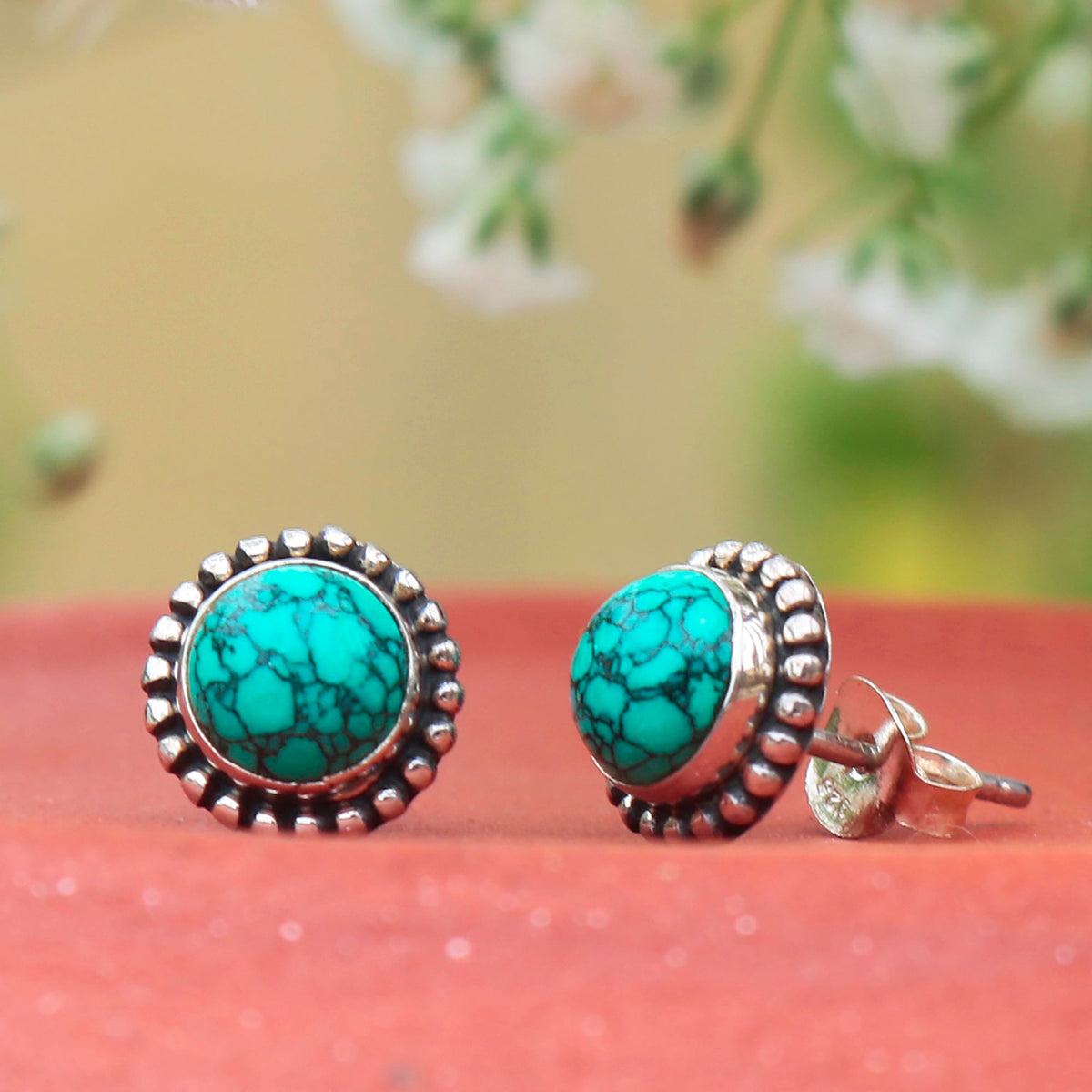 925 Silver Eartops Handmade with round Turquoise stone set in Bezel with push Closure in Oxidised finish.