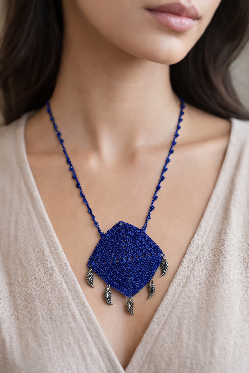blue square necklace with leaf tassel