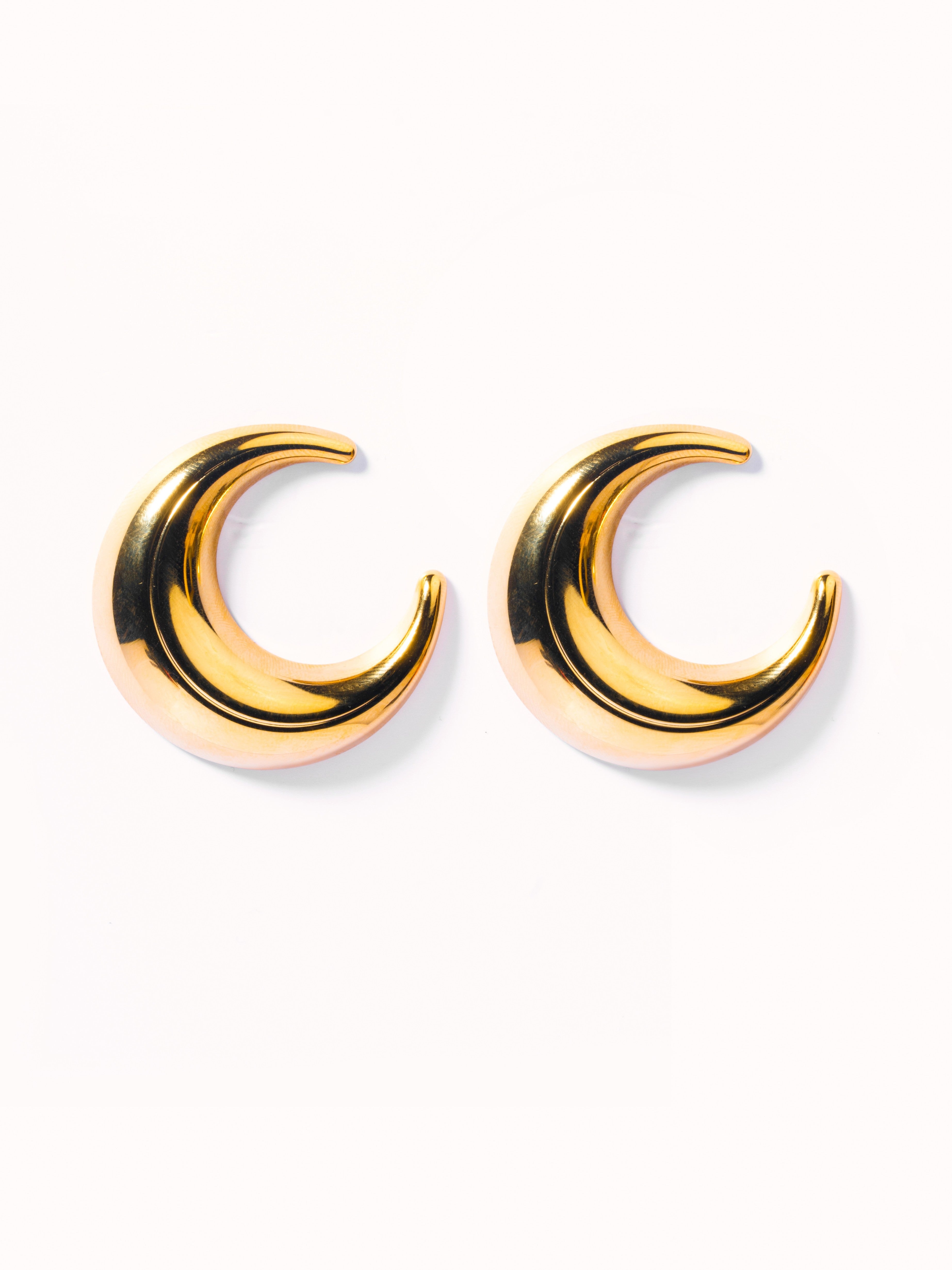 18k gold-plated Moon stud hoop earrings �? bold modern celestial moon hoops, anti-tarnish and waterproof for everyday and evening wear.