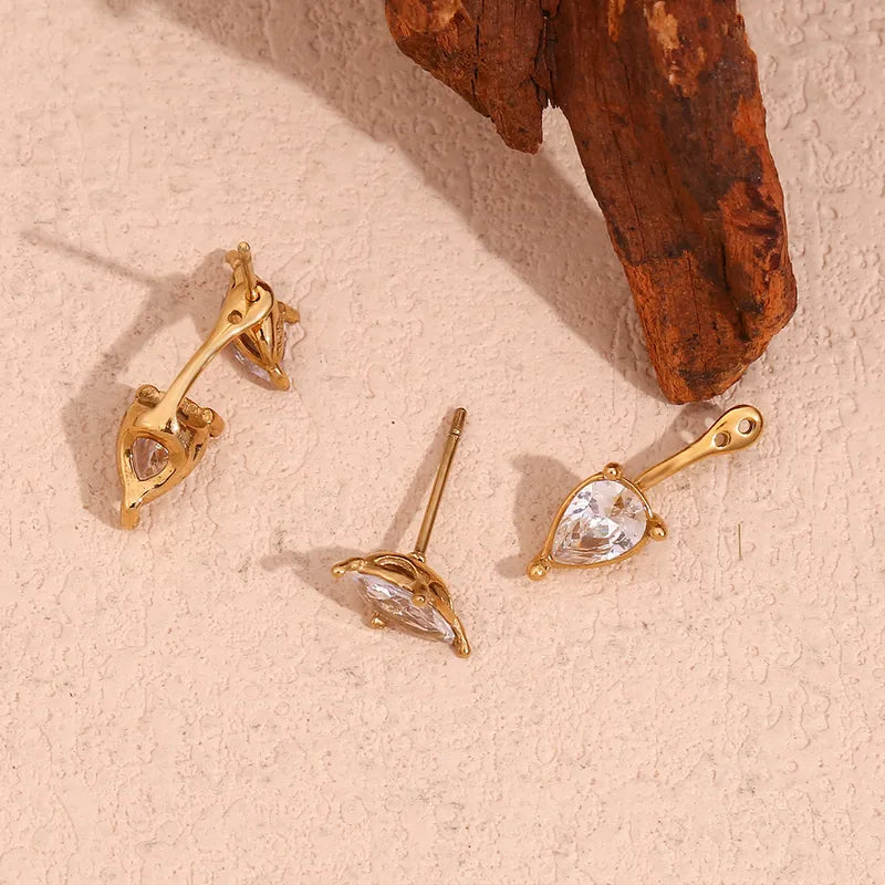 Pair of pear stone drop earrings �? 18k gold-plated pear-cut stone drops for evening and gifting.