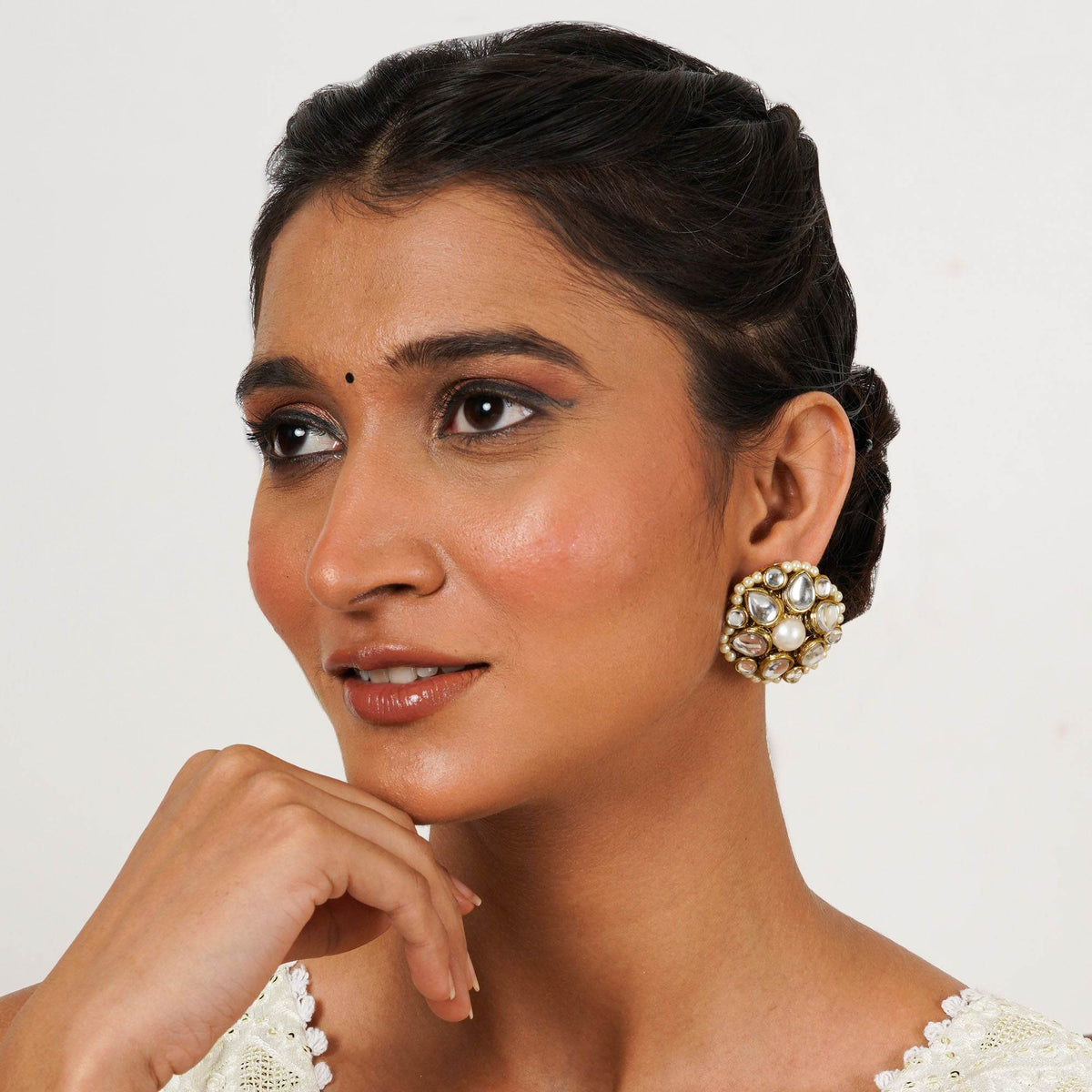 Traditional Kundan earrings in gold-tone, perfect for weddings and festive wear