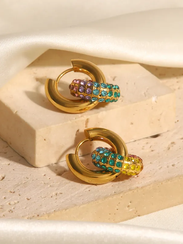 Pair of colour sparkle huggies �? versatile day-to-night hoops with detachable colour charm for evening glam.